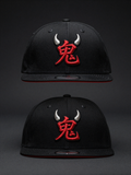 Black snapback cap with embroidered red kanji