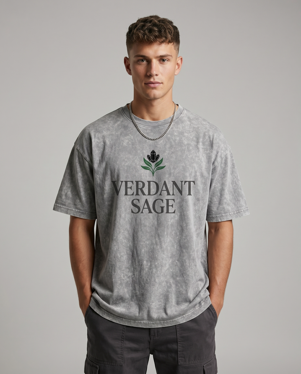 VERDANT SAGE Tee — model front, chest wordmark